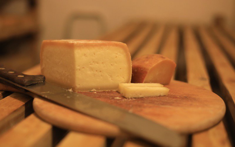 Sheep cheese on a wooden board